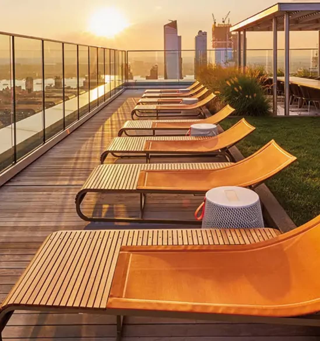 EOS Rooftop lounge: Featuring elegant seating and panoramic views of the city skyline.